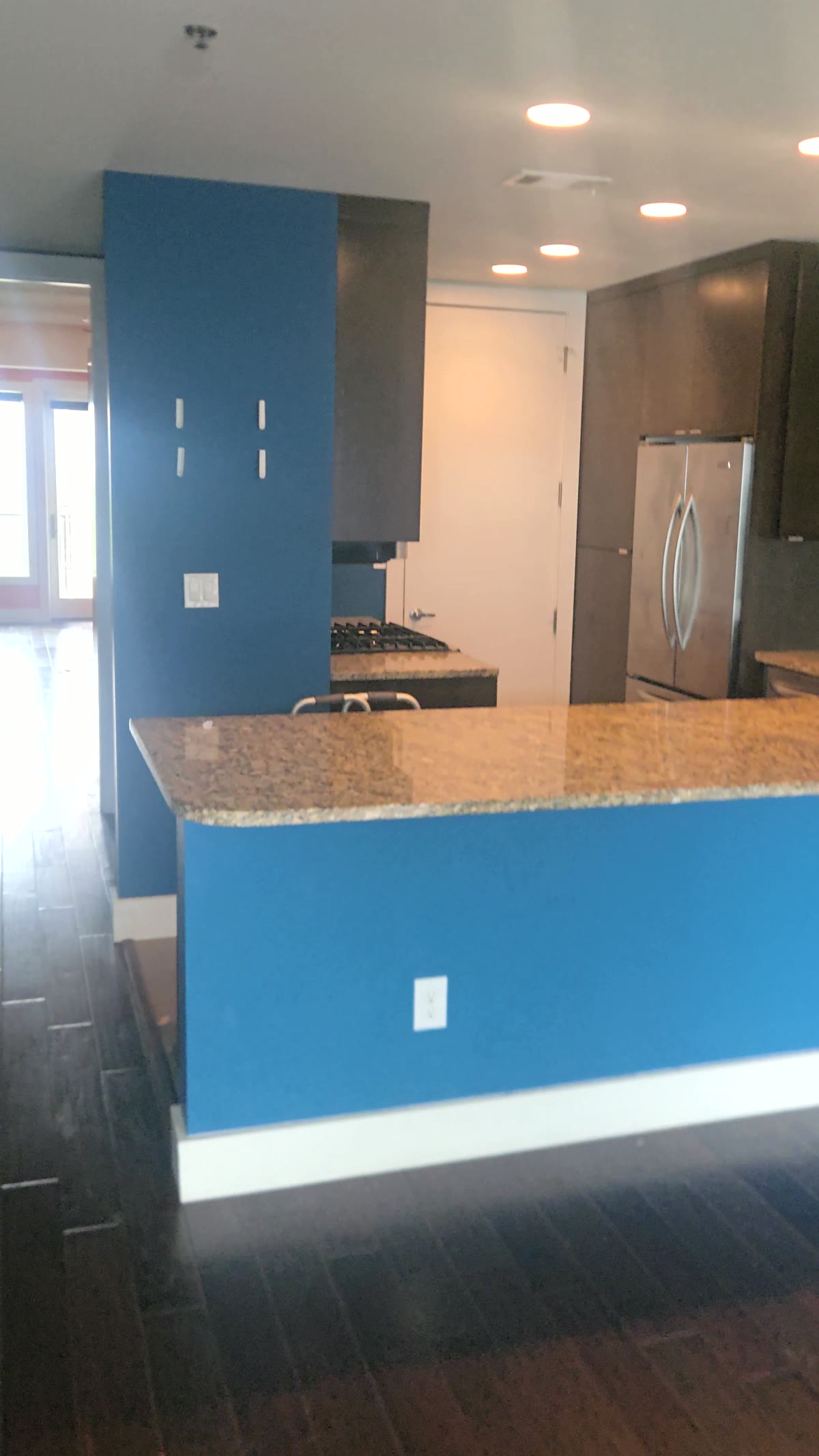 Kitchen after cleanup with counters, floor, and appliances visible